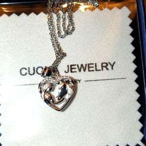 Silver necklace with Diamond accents.